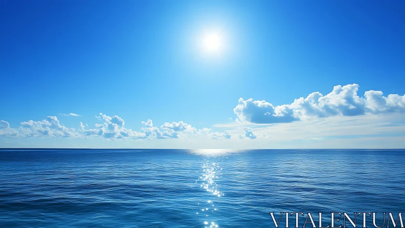 Sunlit open sea extends to horizon under clear blue sky