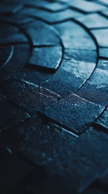 Wet stone tiles form curved segmented pattern in blue light