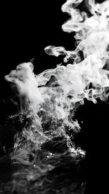 Billowing white smoke meets rippling water in quiet motion