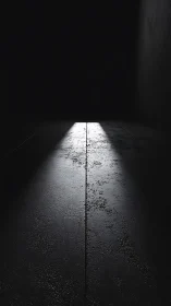 Narrow overhead beam illuminating textured concrete floor