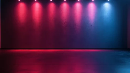 Neon gradient gallery wall under pink and blue spotlights.