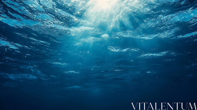 Sunlit blue abyss where wandering rays paint silent water.