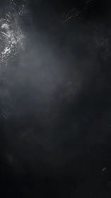 Dark textured background with subtle light and scratches.