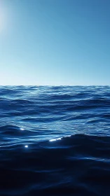 Sunlit ocean horizon captures calm blue surface