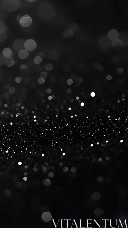 Out of focus white light bokeh dots scattered on black