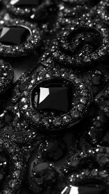 Close-up view of glossy black gemstones and crystals.