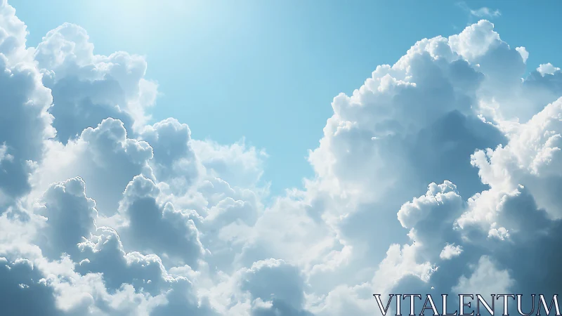 Sunlit cumulus clouds rise softly into a tranquil blue sky