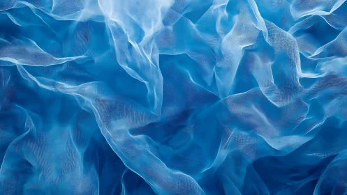 Flowing Blue Sheer Fabric Abstract Art with Soft Texture.