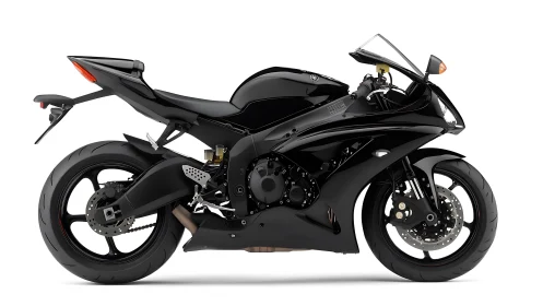 Sleek black sport motorcycle stands ready for the open road