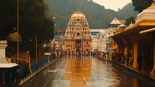 Symmetric wet-temple corridor with ornate gopuram focus.