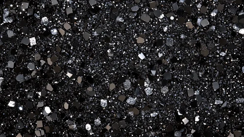 Dense black glitter texture captures metallic sparkle field