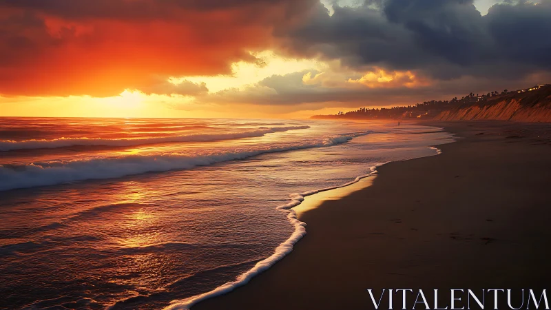 Fiery coastal sunset with reflective surf and dramatic clouds.