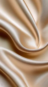 Champagne satin folds with soft highlights and flowing drape.