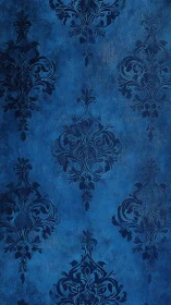 Elegant blue damask pattern over textured grunge background.