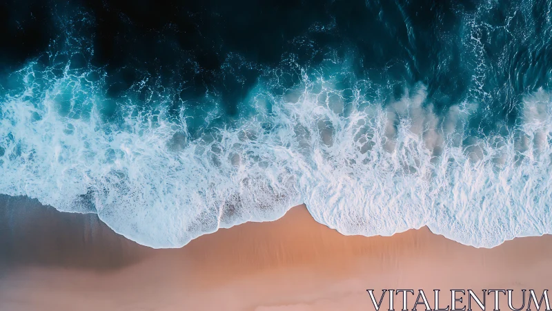 Rolling teal surf washes over soft peach shoreline in calm