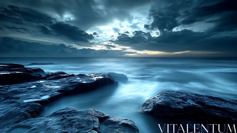 Moody seascape with long‑exposure waves and storm clouds.