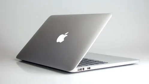 Sleek silver laptop quietly waiting for your next idea.