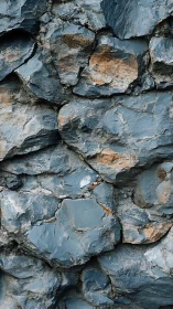 Stone chorus presses together, whispering in slate blue