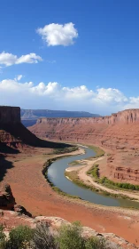 Incised desert meander carving through stratified red rock canyon