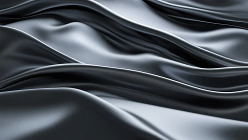 Metallic black satin folds in flowing abstract waves.