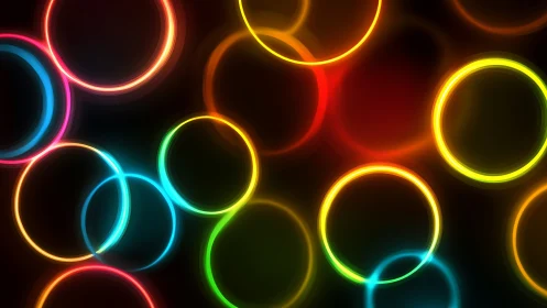 Neon light rings overlap on deep black background in motion