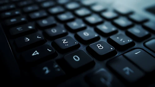 Softly lit keyboard keys invite focused, quiet typing