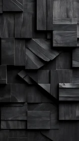 Charcoal geometric wood relief with layered cubic planes.
