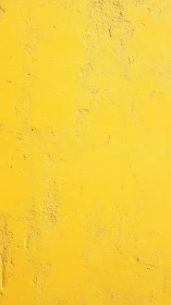 Sunlit yellow wall with cozy texture and quiet charm.