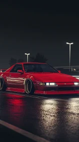 Midnight red street legend resting on rain-lit asphalt.