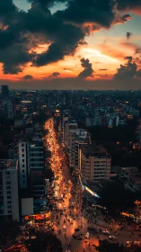 Busy city avenue under dramatic sunset sky glow.