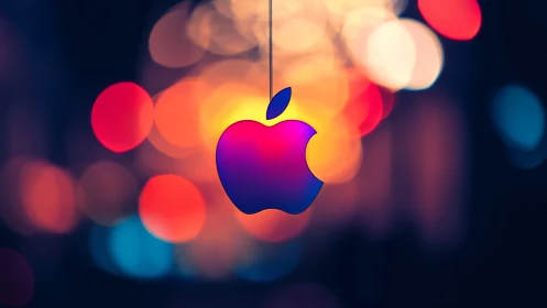 Gradient apple emblem with luminous bokeh backdrop.