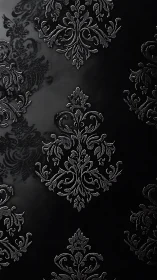 Embossed silver damask ornaments repeat on glossy black