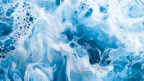 Swirling blue foam drifts in a dreamy, ocean inspired pattern