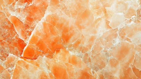 Orange onyx marble slab shows crystalline fracture network.