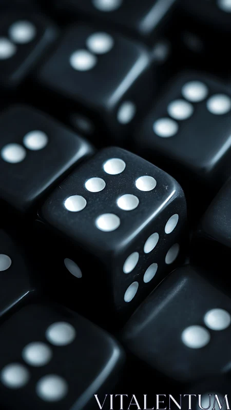 Macro depth-of-field study of clustered black gaming dice.