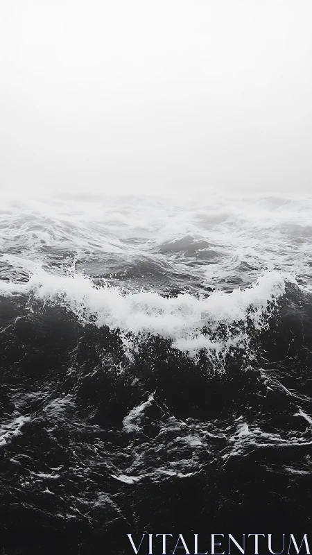 Monochrome storm waves collide beneath dense sea fog.