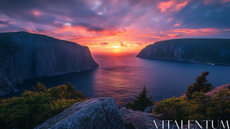 Fiery sunset gateway between brooding ocean cliffs.