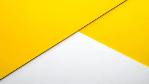 Diagonal yellow cardstock planes intersecting over white ground