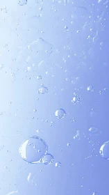 Crystal water bubbles drift through soft blue gradient field.