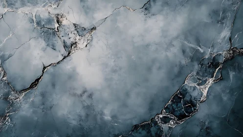 Blue marble stone texture with dramatic cracks, abstract style.