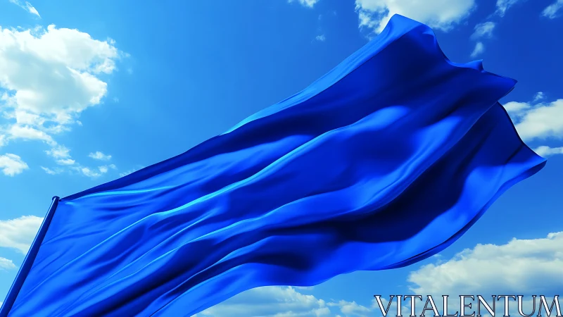 Bright blue flag dances freely in a wide open summer sky