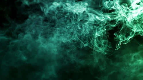 Emerald smoke swirls in dense abstract atmospheric clouds.