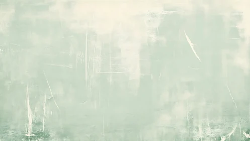 Textured pale green painted wall surface shows subtle wear