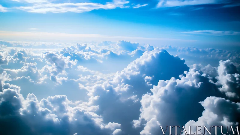 High-altitude cumulus cloudscape under vibrant blue sky.