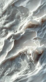 Gentle milk tide rolling over dreamy foamy folds.