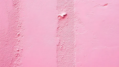 Textured pink wall surface with soft tonal stripes detail.