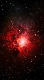 Red emission nebula glows amid dense starfield in deep space