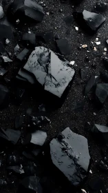 Shattered obsidian slabs on granular midnight ground.