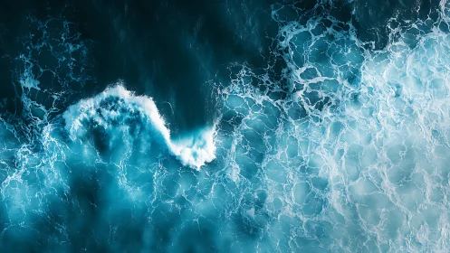 Gentle clash of teal waves in a swirling ocean dance.