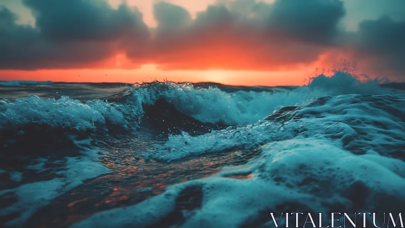 Stormy teal ocean waves under intense red sunset sky.